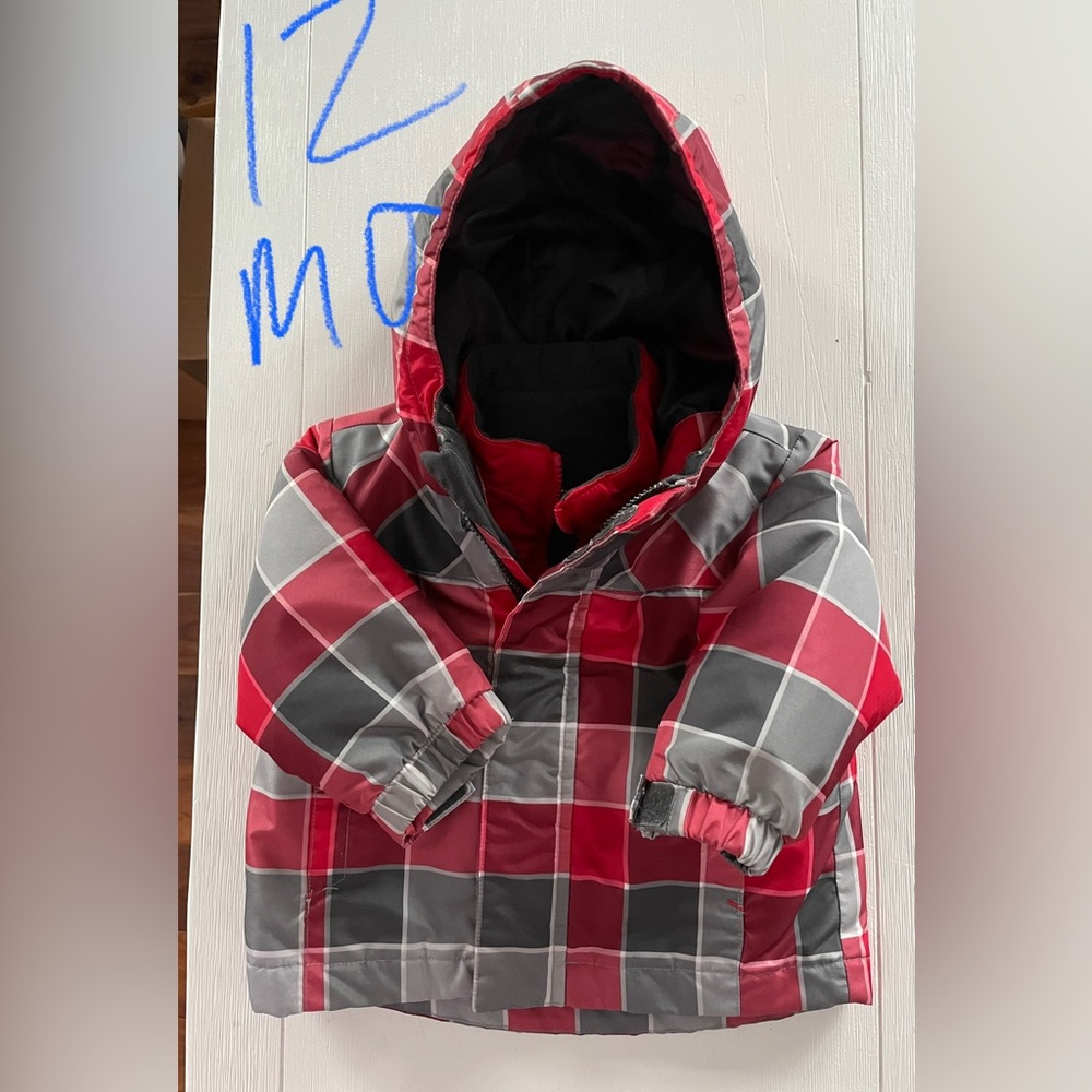 Coat with removable inner liner. Great condition. No holes or stains.